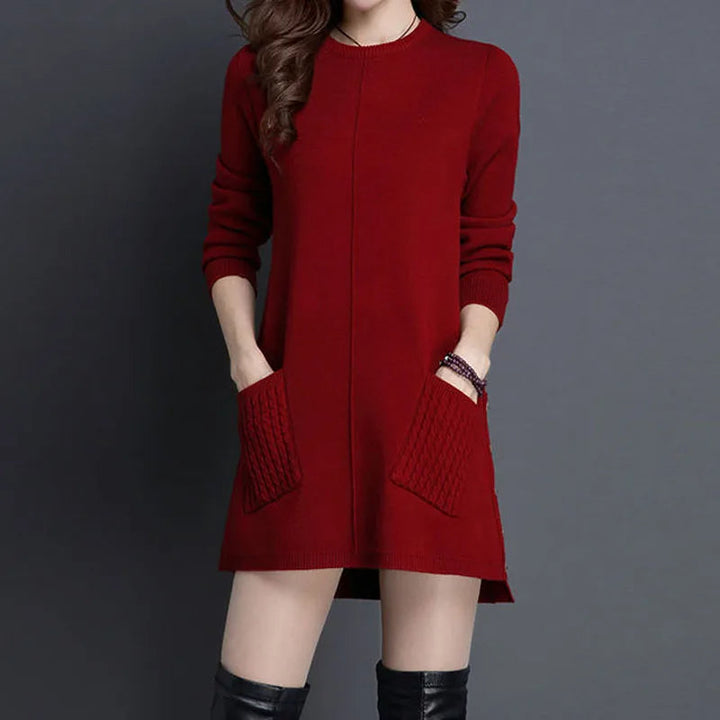 Women's fall/winter longline sweater dress, with button detail & pockets for cozy, stylish everyday comfort.