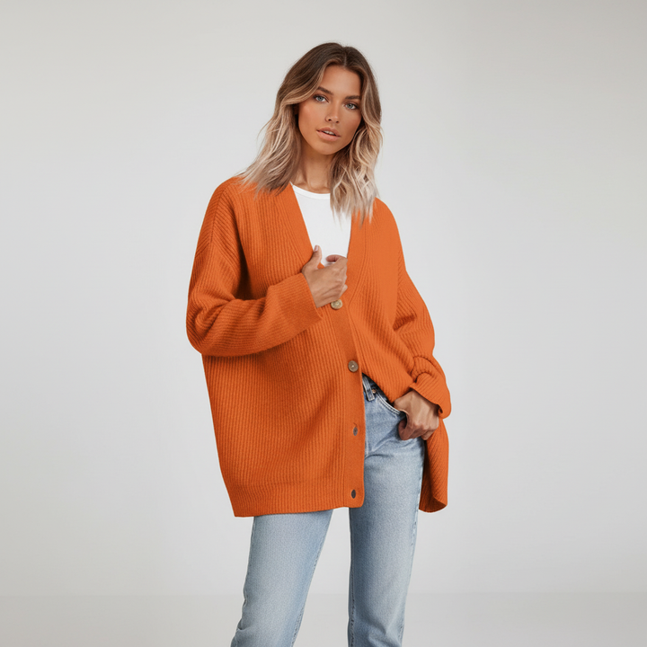 High-quality women's cashmere V-neck waistcoat, showcasing fine knitwear and a relaxed silhouette