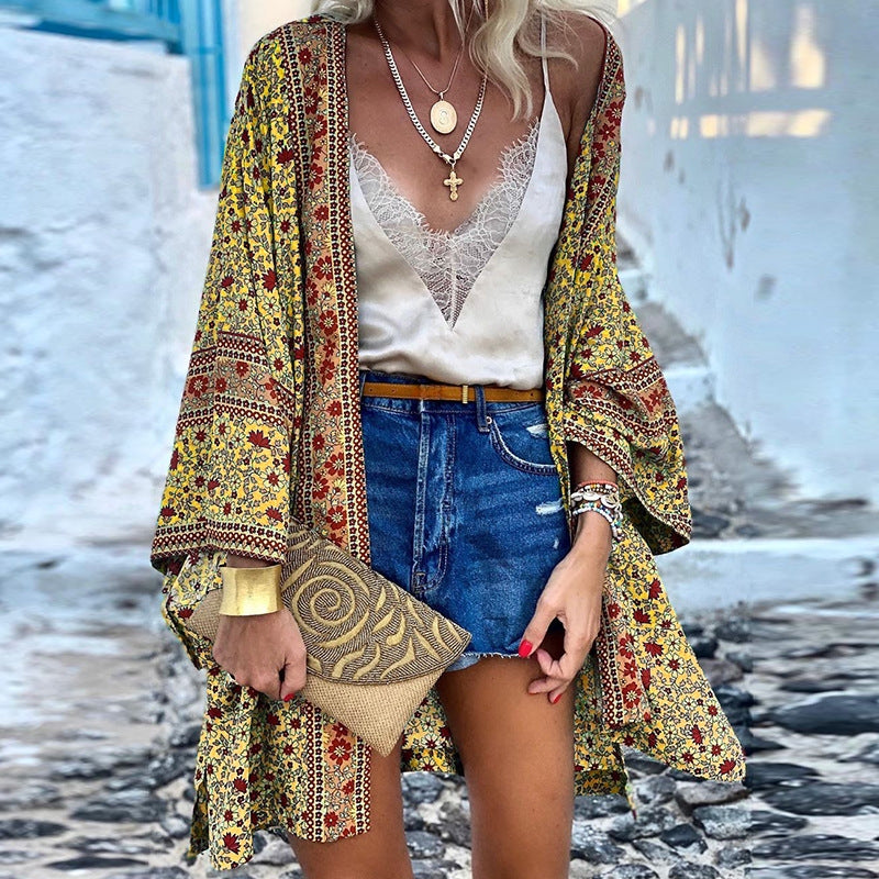 Women's loose fit boho patterned cardigan. Trendy long sleeve bohemian everyday wear layering piece.