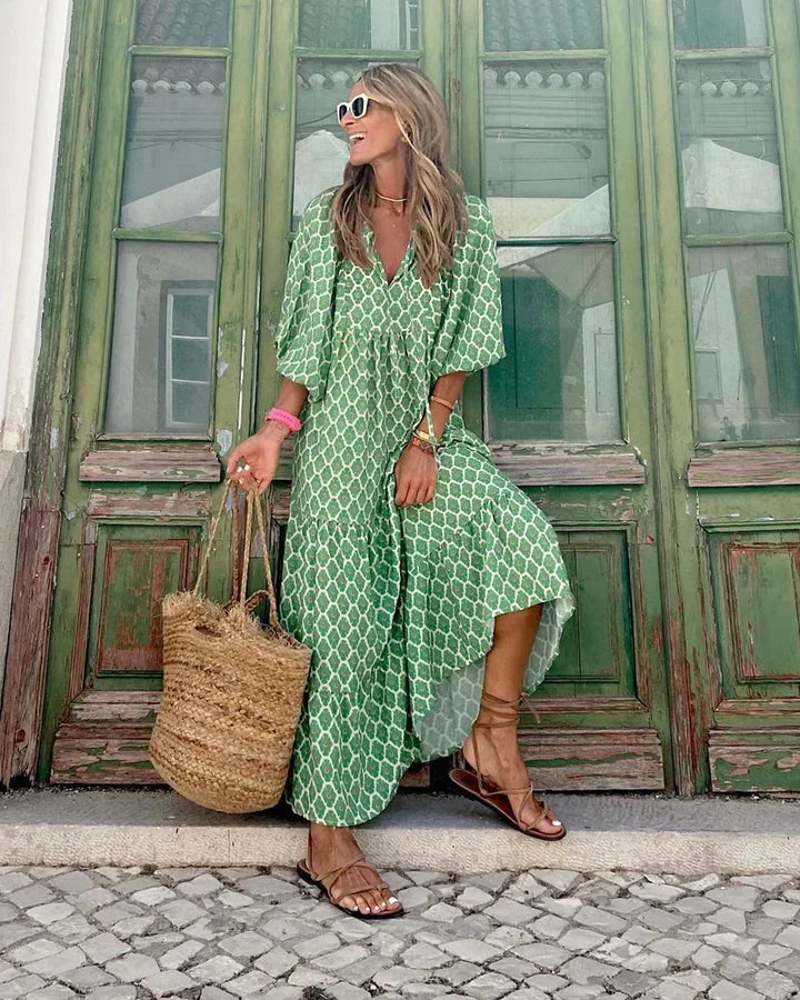 Chic women's loose fit boho dress, embodying Ibiza summer style. Flowy fabric, great for vacation & relaxed wear.