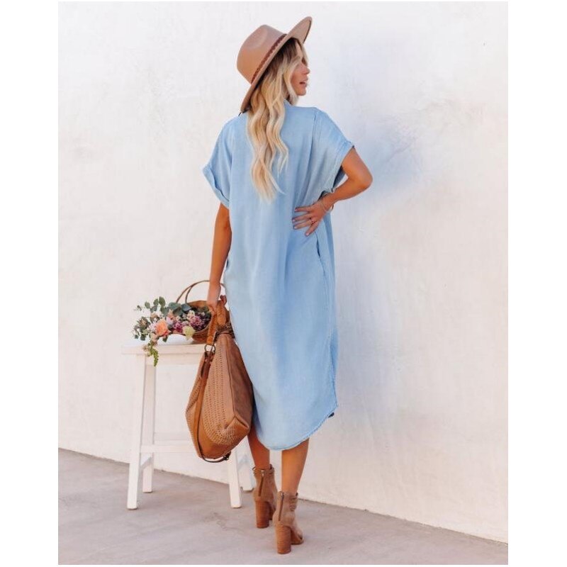 Versatile women's denim midi dress. Loose-fit casual style for effortless everyday wear and chic summer fashion.