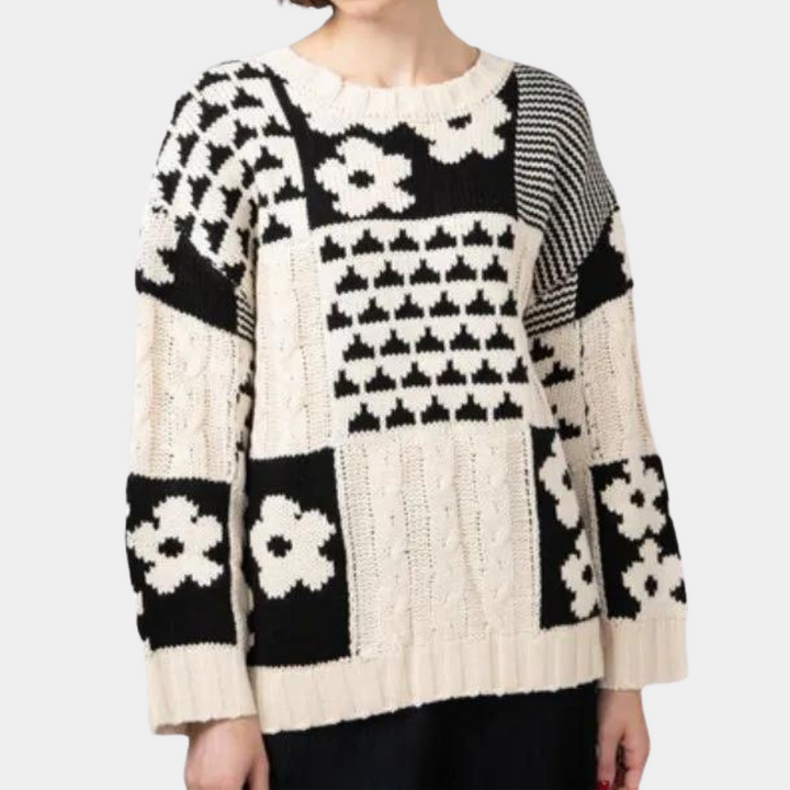 Women's loose-fit floral knitted sweater. Perfect for cozy fall fashion & everyday chic comfort.