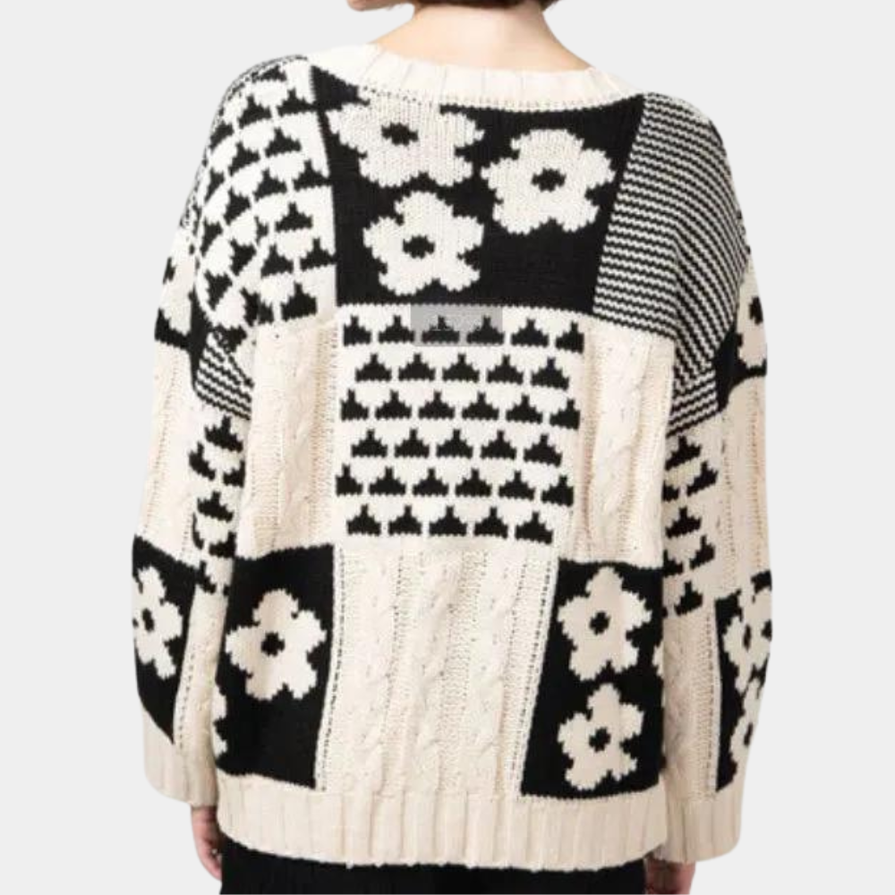 Cozy women's long-sleeve knitted top featuring a beautiful floral print & comfortable loose fit.