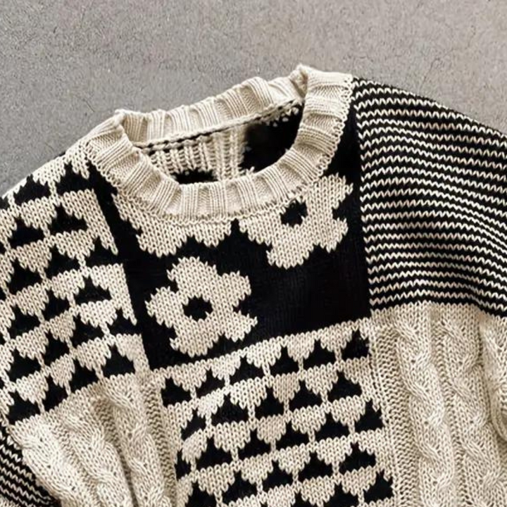 Women's loose floral print knitted sweater, a cozy long-sleeve top for fall and winter fashion.