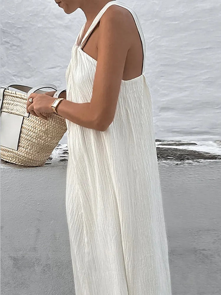 Stylish sleeveless midi dress for women, black, offering a comfortable and loose fit