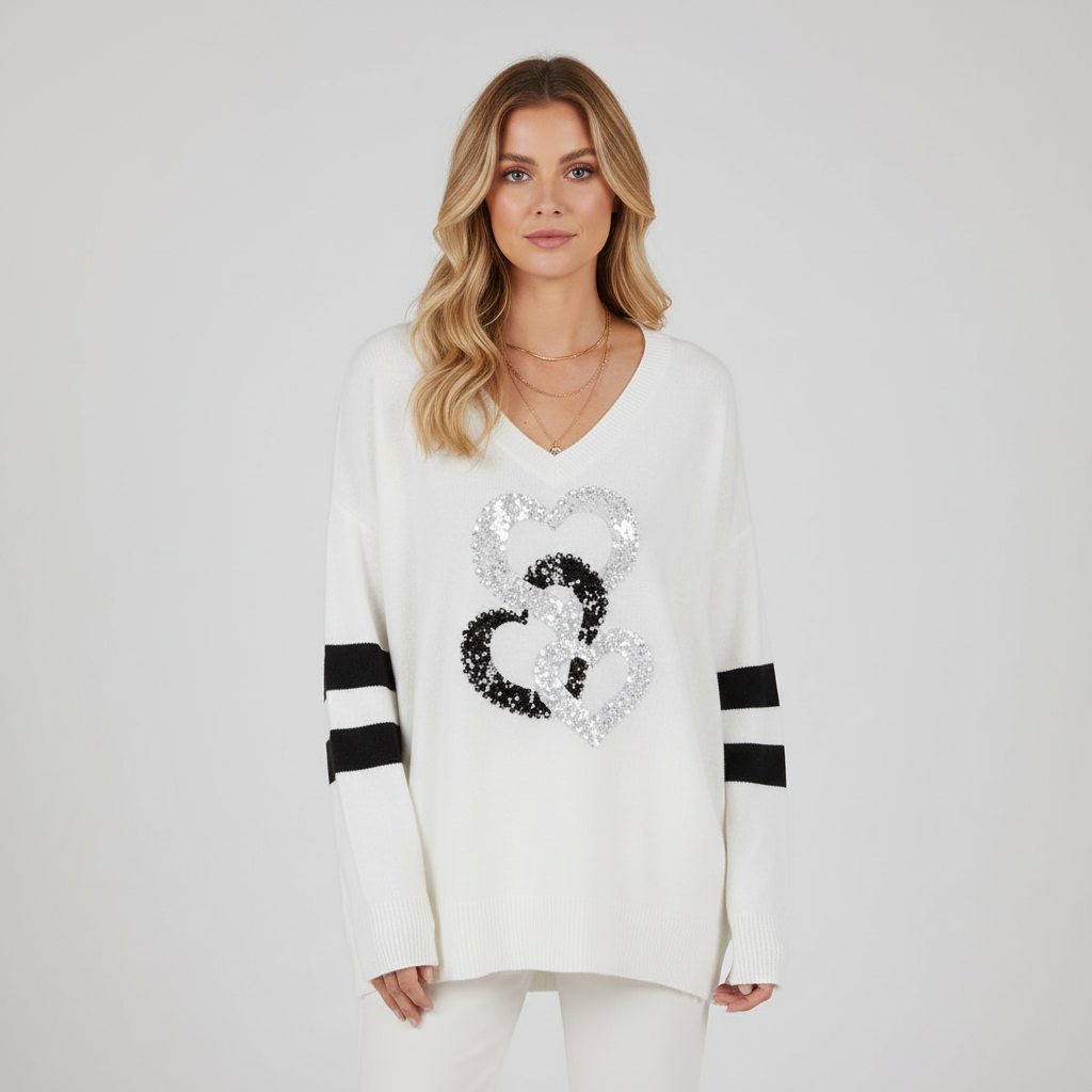 Casual women's knitwear: V-neck sweater with a distinctive heart pattern, designed for a loose fit.
