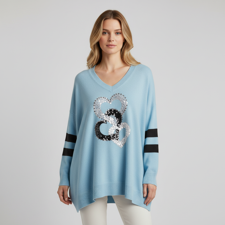 Stylish women's loose V-neck sweater, showcasing a beautiful heart knit, suitable for everyday wear.