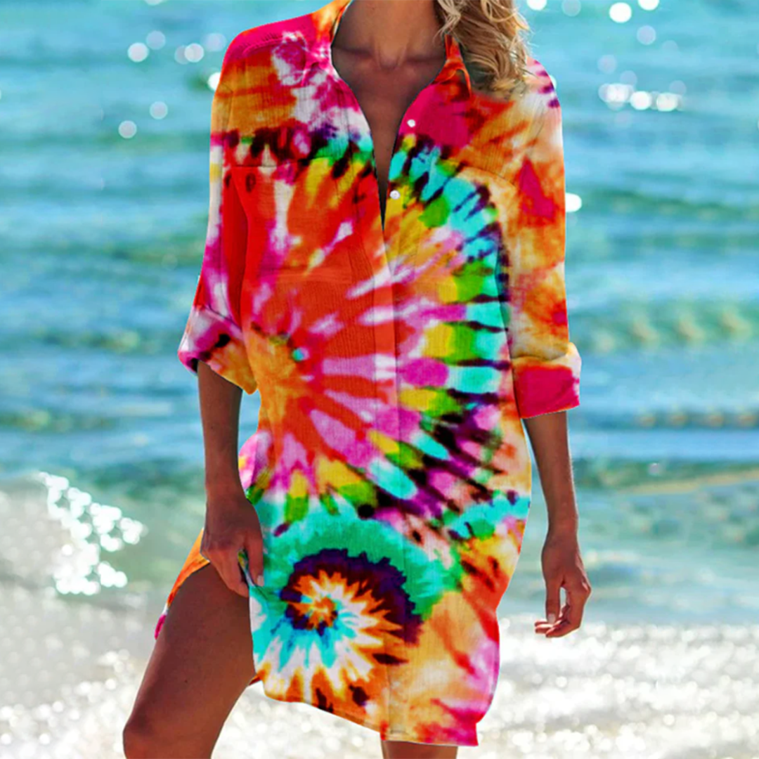 Women's loose printed summer shirt with pockets. Casual a-line tunic top, great for vacation wear.