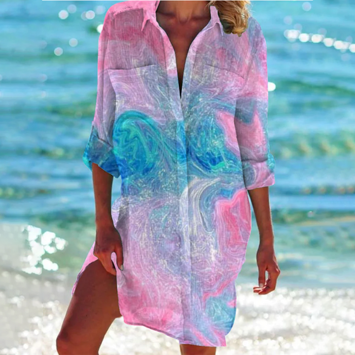 Casual women's printed summer tunic shirt. Loose a-line fit with pockets, perfect for vacation or everyday.