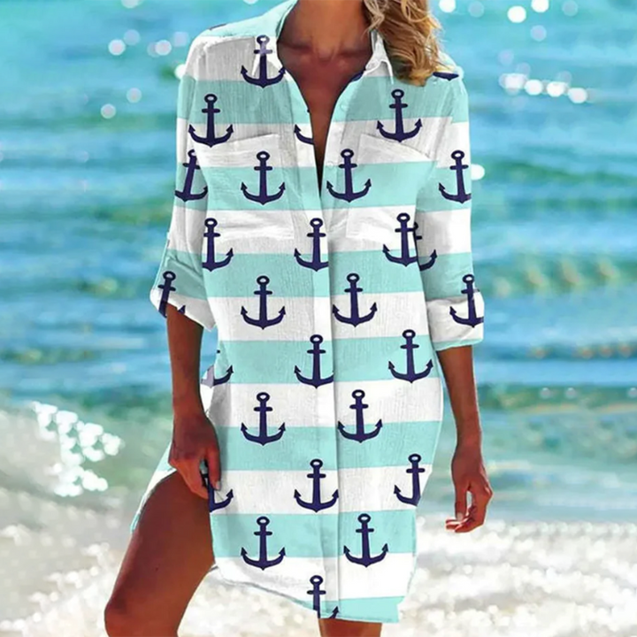 Women's loose printed summer shirt with pockets. A-line design, perfect as a stylish beach cover-up or tunic.