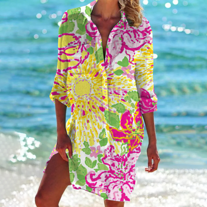 Women's printed summer shirt, loose a-line fit, with practical pockets. Versatile for beach, vacation, or casual.
