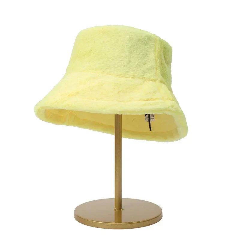 Women's autumn faux fur bucket hat, combining comfort, warmth, and modern fashion.
