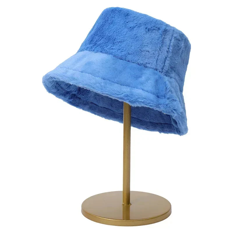 Warm faux fur bucket hat for women, a cozy and stylish cold weather hat.