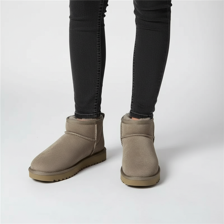 Elegant women's low-cut sheepskin winter boots. Regina ankle boots provide warmth and style.