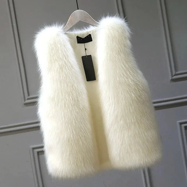 Cozy Lucent faux fox fur vest for women. Enjoy luxurious warmth & sophisticated style for any occasion.