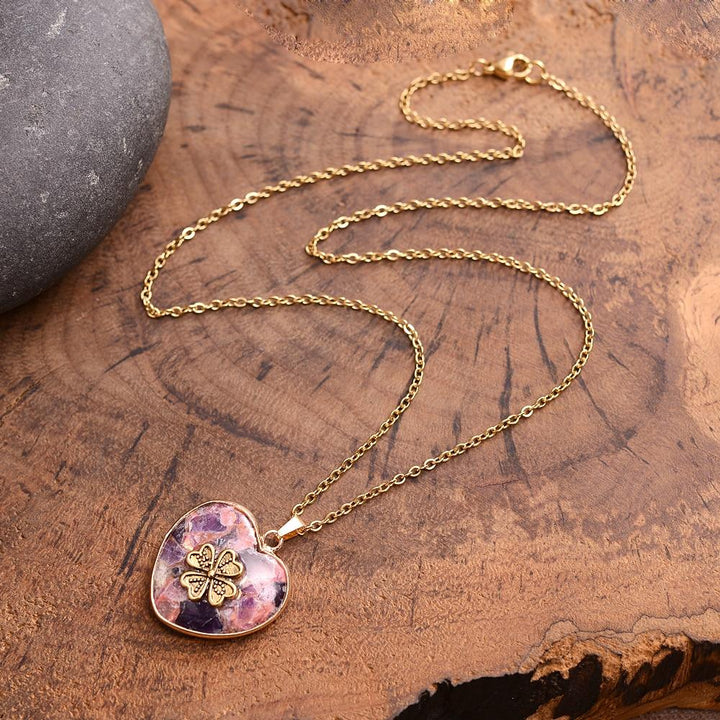 Stylish women's Lucky Clover Rhyolite necklace, a handmade gemstone spiritual gift. Perfect for unique positive energy.