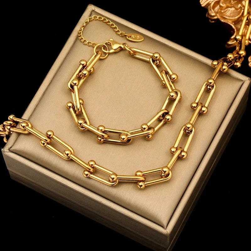 Women's Lumiere gold link necklace & bracelet set. Elegant premium plated jewelry accessories for her.