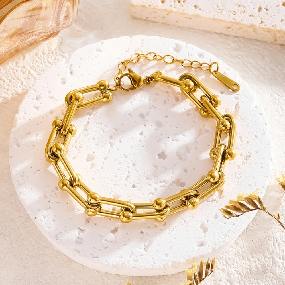 Elegant Lumiere gold link necklace & bracelet set. Ideal women's jewelry gift, versatile for any occasion.