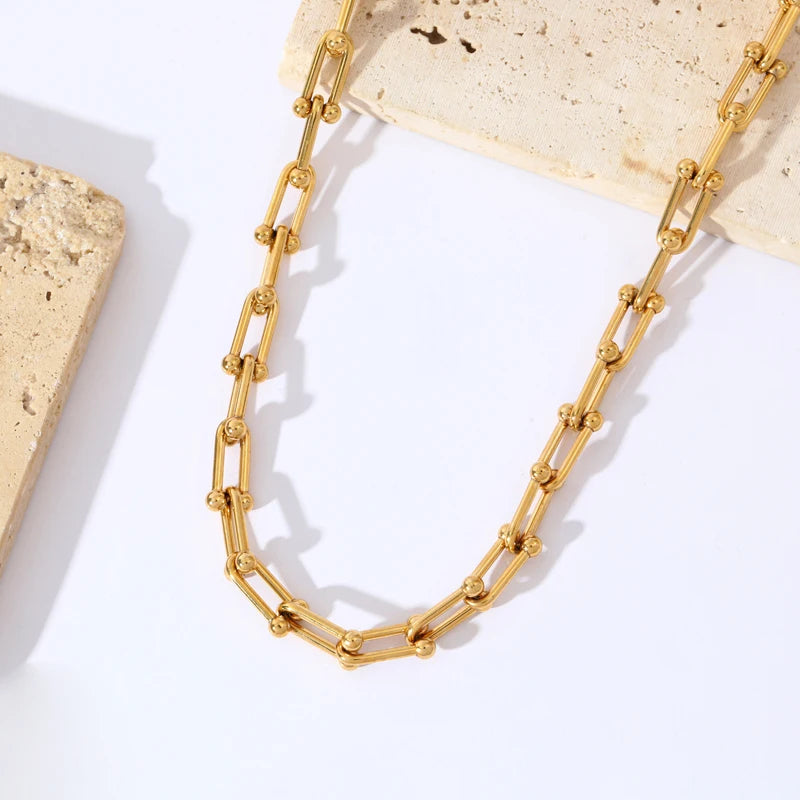 Lumiere gold link jewelry set adding sophistication to an outfit. Women's premium plated accessories.