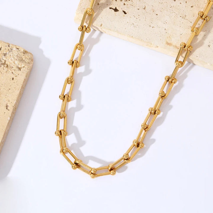 Lumiere gold link jewelry set adding sophistication to an outfit. Women's premium plated accessories.