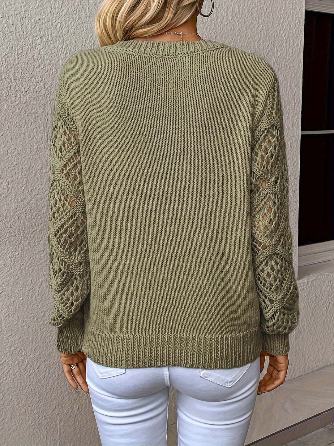 Versatile women's Luna long sleeve pullover sweater. Chic hollow-out knit design & V-neck for everyday style.