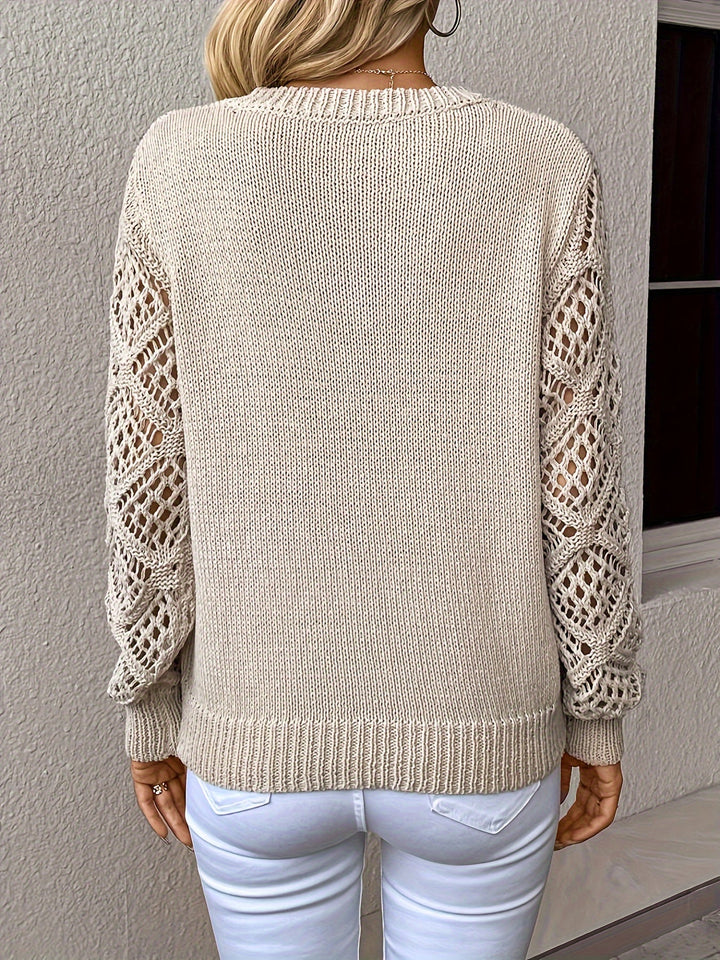 Trendy women's Luna pullover sweater featuring a unique hollow-out knit & flattering V-neck. Casual chic.
