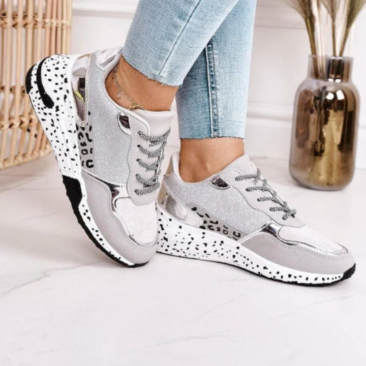 Trendy Luna women's walking shoes with ergonomic support, comfortable for casual wear. Available in gold.