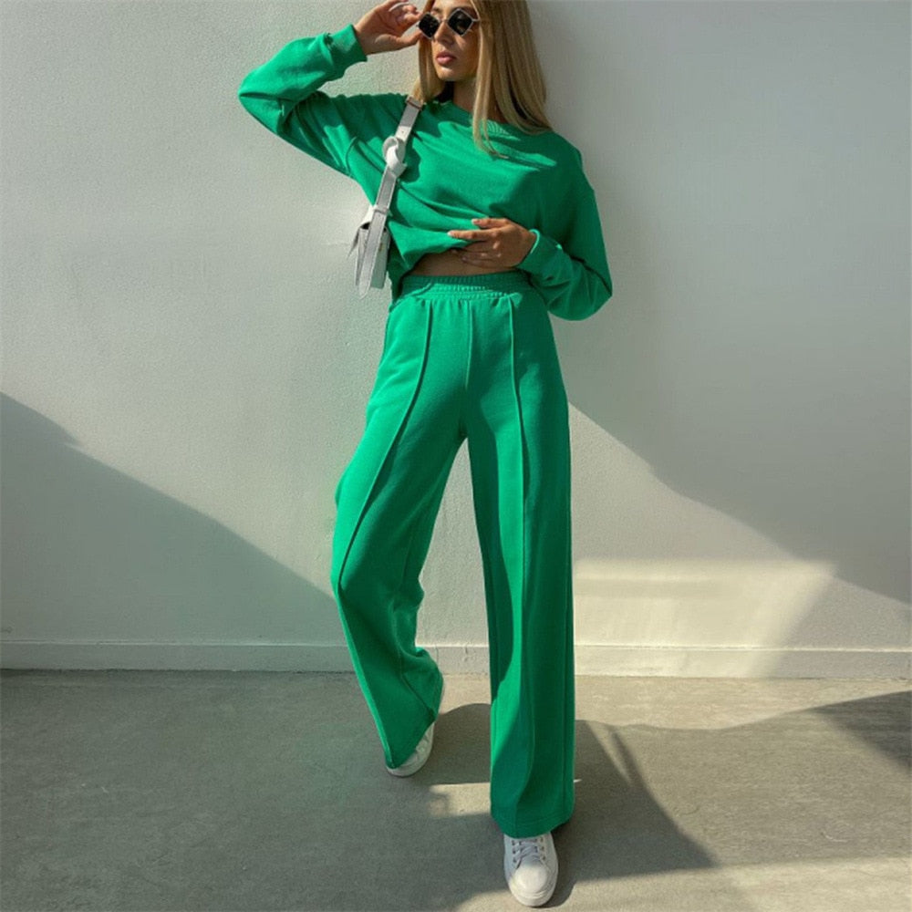 Women's luxe 2-piece tracksuit set in soft fabric for ultimate comfort & style. Perfect cozy lounge wear.