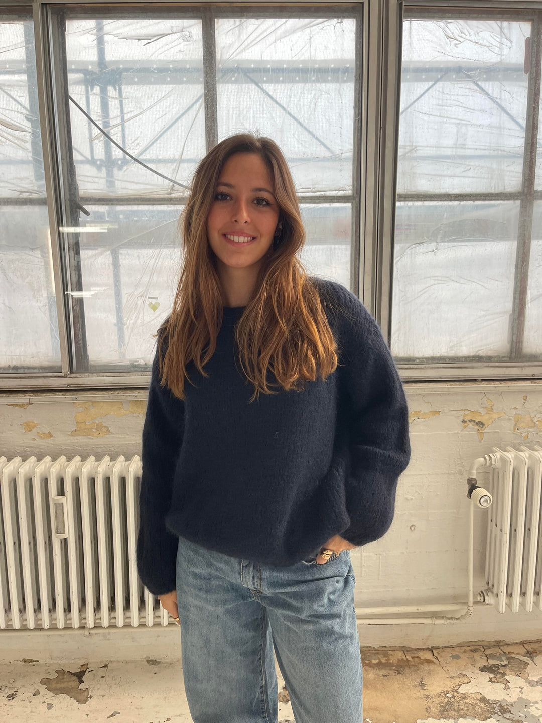 Relaxed fit women's comfort sweater, versatile luxury top for autumn and winter style.