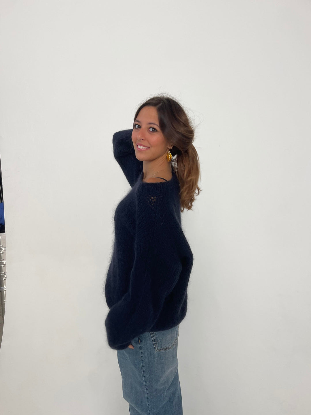 Versatile women's luxury apparel sweater, relaxed fit, ideal for chic casual wear.