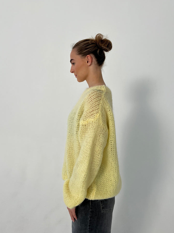 Casual wear women's long sleeve sweater, offering a chic relaxed fit & comfort.