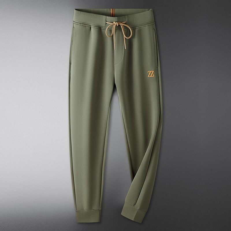 Modern women's luxe cotton blend trousers, combining comfort and chic style effortlessly.