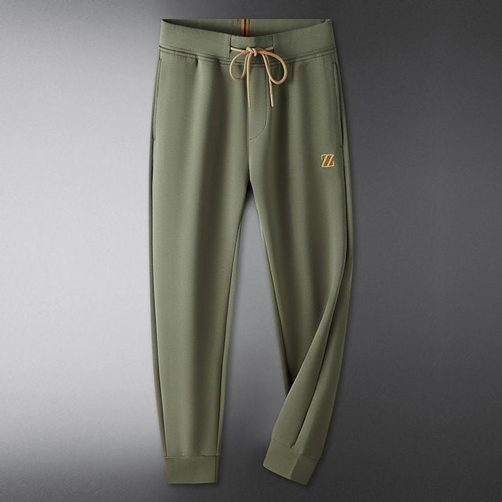 Modern women's luxe cotton blend trousers, combining comfort and chic style effortlessly.