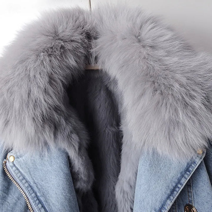 Cozy women's winter coat featuring a detachable plush collar & stylish gold accents, ensuring warmth & chic look.