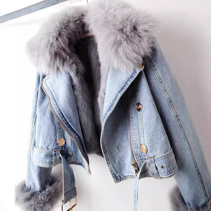 Elegant women's warm winter coat, luxuriously lined with gold hardware. Perfect stylish outerwear for cold weather.