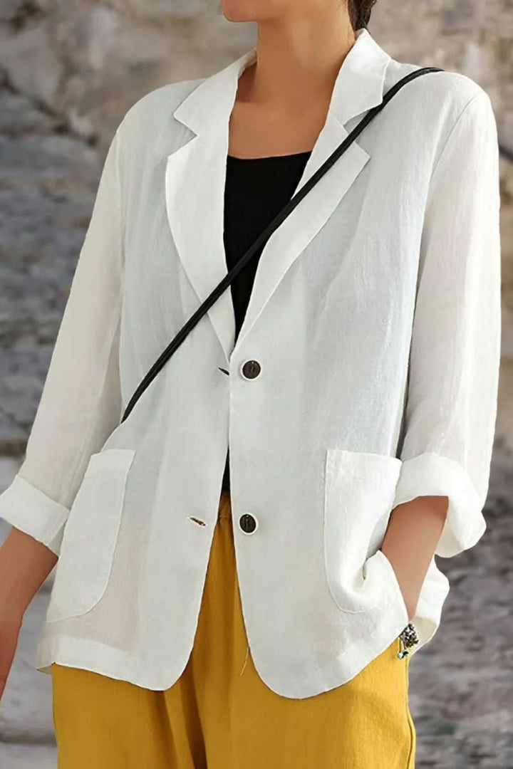 Women's luxe open back blazer in a tailored fit, perfect for modern office fashion or evening wear. Stylish & versatile.