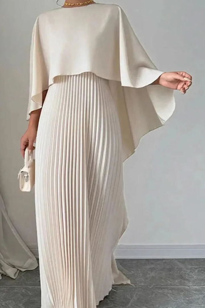 Women's luxe pleated cape maxi dress, perfect for elegant evenings, formal events, or as a wedding guest.