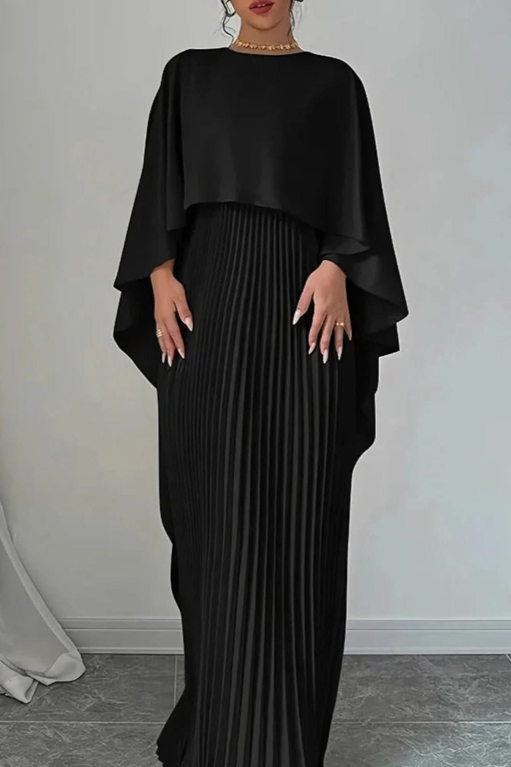 Graceful women's formal pleated maxi dress with a stunning cape, an ideal choice for any elegant evening event.