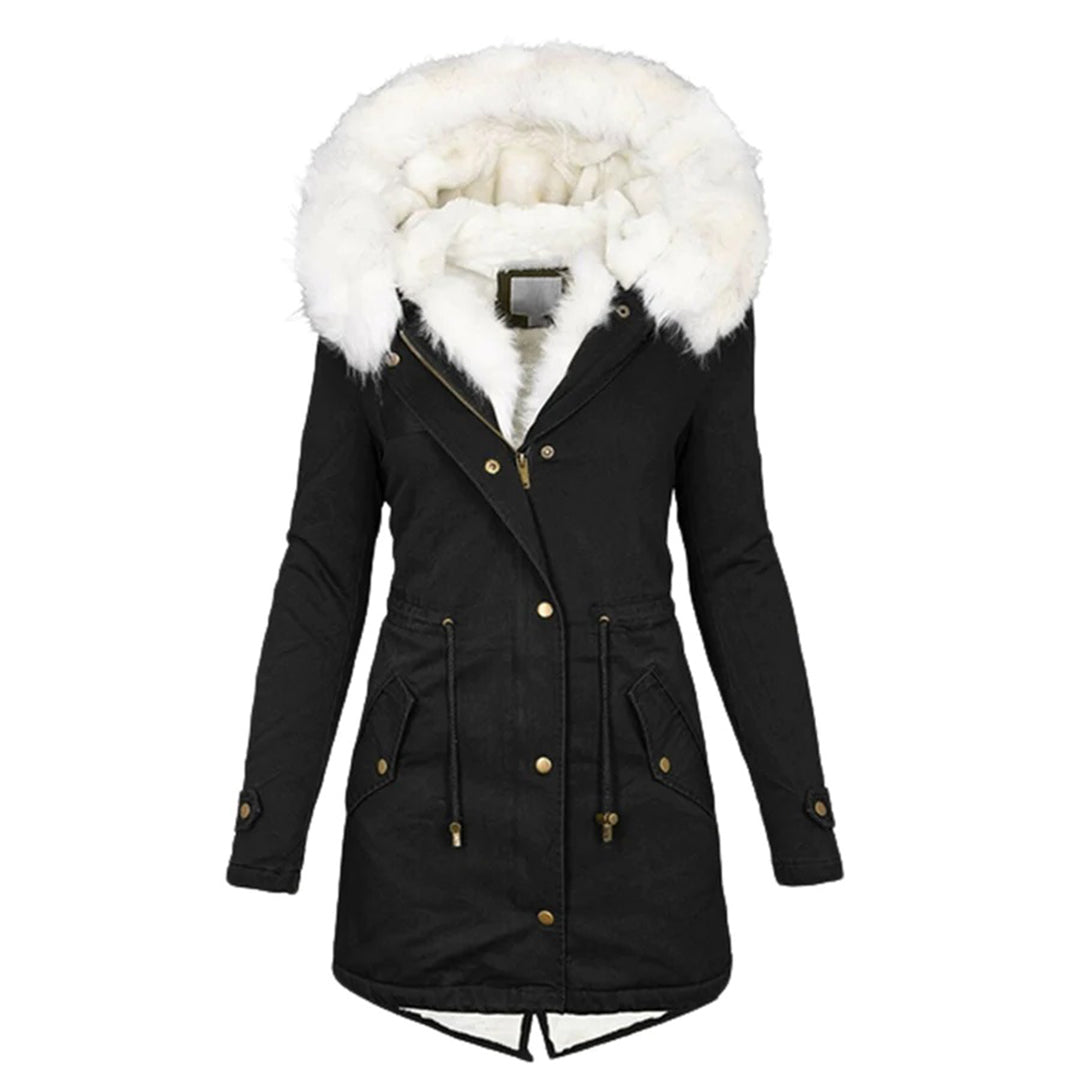 Insulated women's luxe coat, providing warmth and fashion for winter outdoor wear.