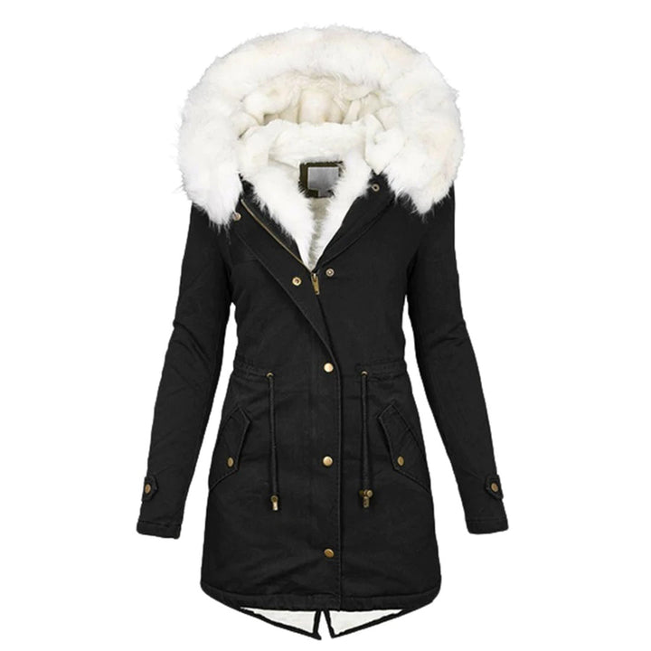 Insulated women's luxe coat, providing warmth and fashion for winter outdoor wear.