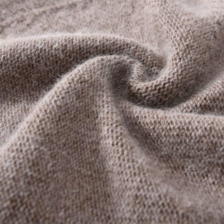 Ultra-soft women's cashmere beanie hat, offering luxurious warmth and comfort for cold days.