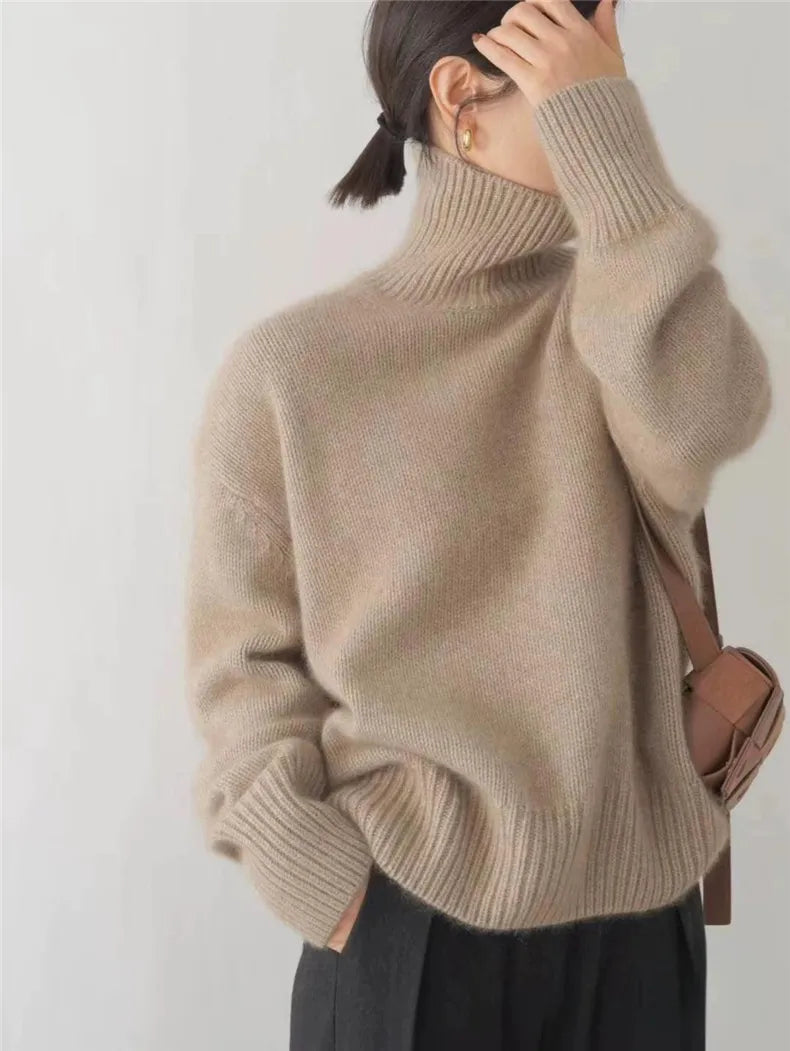 Warm and elegant women's cashmere turtleneck sweater. A luxurious, soft knit pullover, ideal for cozy fall and winter wear.