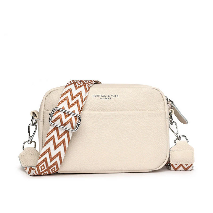 Women's Luxurious Genuine Leather Shoulder Bag. Premium cowhide daily accessory.