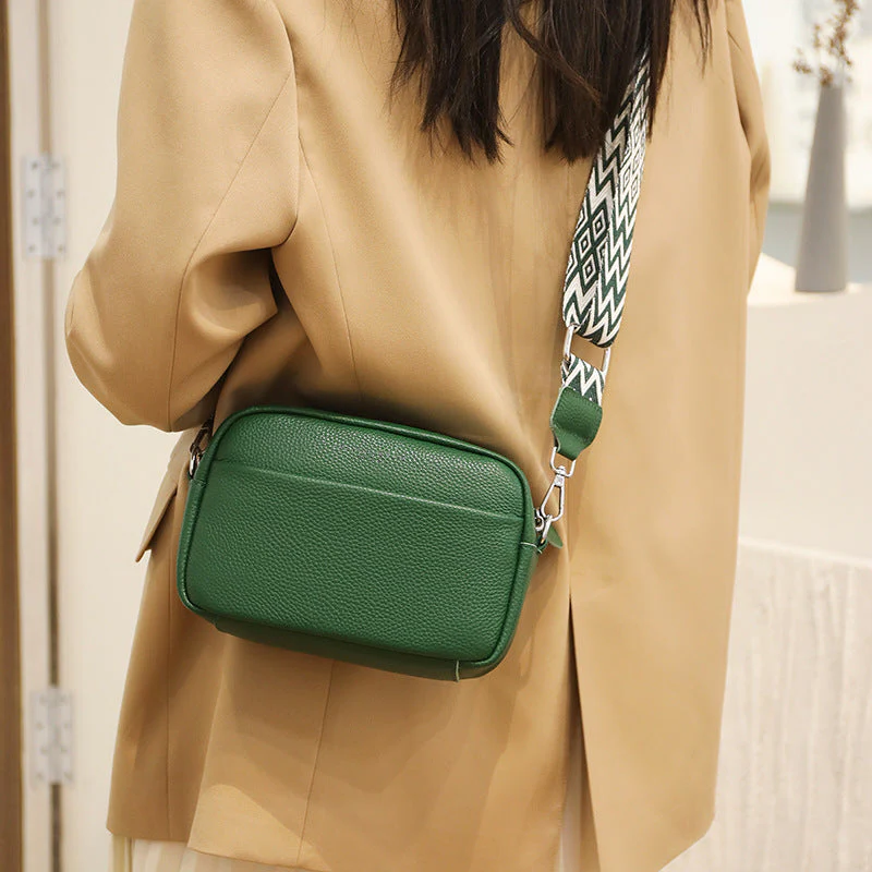 Elegant Black Genuine Leather Crossbody Bag. Luxurious women's daily accessory.