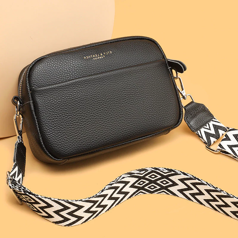 Classic women's genuine leather handbag. Sophisticated shoulder or crossbody bag style.