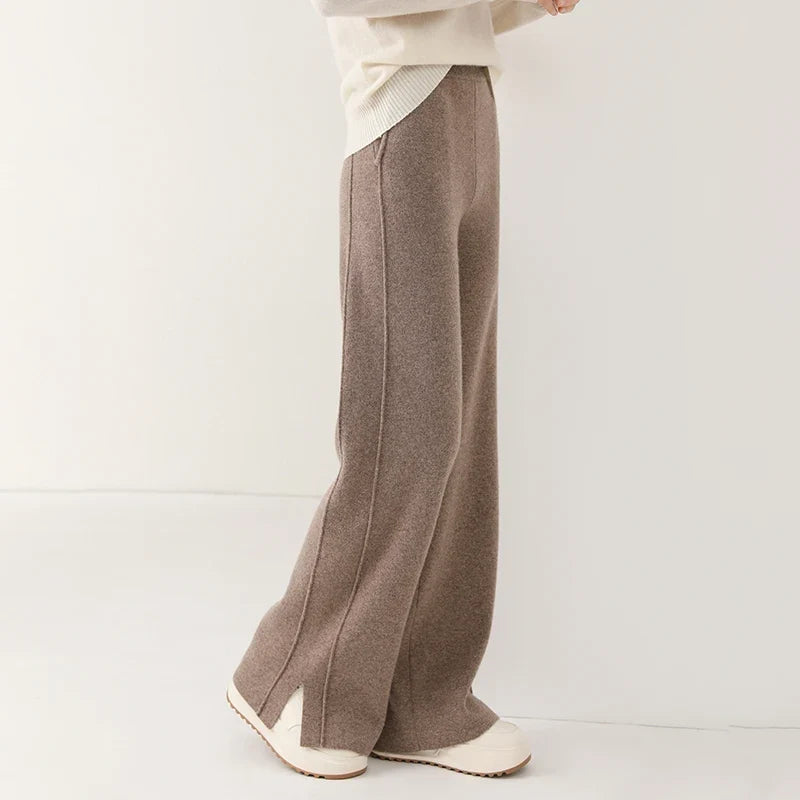 Women's luxurious merino wool trousers, relaxed fit, perfect for cozy winter fashion.