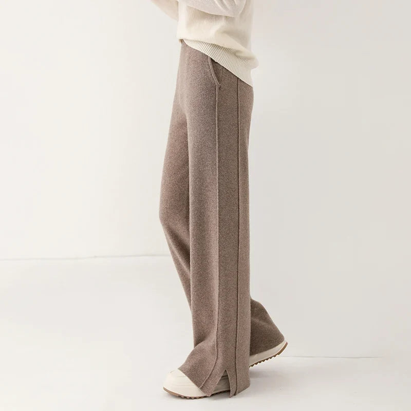 Relaxed fit women's merino wool trousers, elegant and cozy for sophisticated winter wear.
