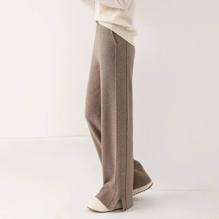 Relaxed fit women's merino wool trousers, elegant and cozy for sophisticated winter wear.
