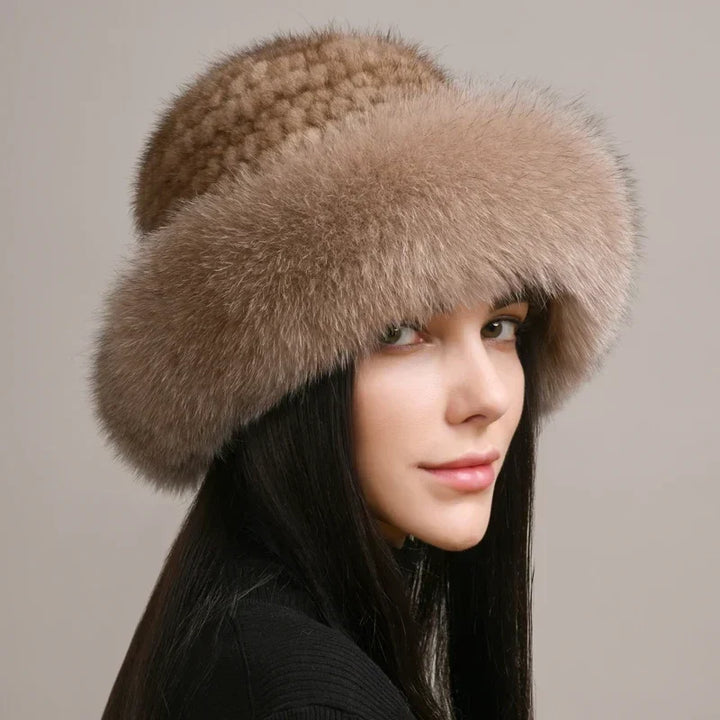 Elegant women's mink fur hat in a rich brown shade, providing superb warmth and a luxury fashion accessory.