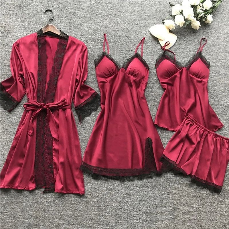 Elegant women's satin nightwear pajama set featuring delicate lace trim, ideal for luxury sleepwear.